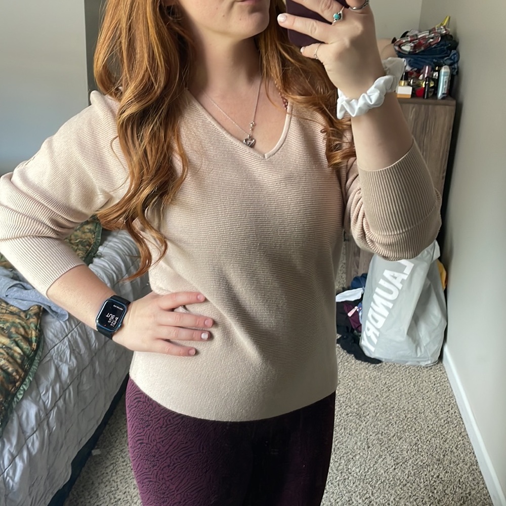 Cream colored V neck sweater